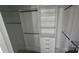 Walk-in closet with multiple shelves and drawers for optimal storage and organization at 16425 Grapperhall Dr, Huntersville, NC 28078