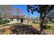 Charming one-story home featuring a welcoming front porch and well-maintained lawn at 16425 Grapperhall Dr, Huntersville, NC 28078