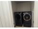 Contemporary laundry room with front-loading washer and dryer at 16425 Grapperhall Dr, Huntersville, NC 28078