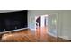 Living room with hardwood floors and glass paneled French doors at 16425 Grapperhall Dr, Huntersville, NC 28078