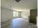 Bonus Room with wood-look floors, lots of light, and neutral paint at 168 Wildwood Loop, Statesville, NC 28625