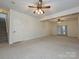 A spacious basement provides a versatile living area, complete with stairs and a door to the outside at 25040 Timberlake Dr, Tega Cay, SC 29708