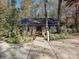 Charming home featuring a well-manicured front yard and inviting front porch at 25040 Timberlake Dr, Tega Cay, SC 29708