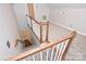 Bonus room with carpeted floor and wooden railing at 6146 Highview Rd, Matthews, NC 28104