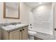 Bathroom featuring wood-trimmed mirror over a sink with a shower-tub combo at 1100 Turkey Creek Ridge Rd, York, SC 29745