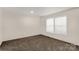 Simple bedroom with carpet and neutral walls at 1100 Turkey Creek Ridge Rd, York, SC 29745