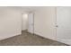 Carpeted bedroom with double doors and access to closet at 1100 Turkey Creek Ridge Rd, York, SC 29745