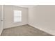 Bright bedroom with carpeted floor and window at 1100 Turkey Creek Ridge Rd, York, SC 29745