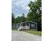 Charming home with gray siding, white trim, and a cozy front porch at 1100 Turkey Creek Ridge Rd, York, SC 29745