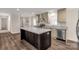 Open concept kitchen featuring an island and hardwood floors at 1100 Turkey Creek Ridge Rd, York, SC 29745