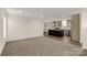Living room with open concept kitchen and island at 1100 Turkey Creek Ridge Rd, York, SC 29745