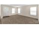 Bright living room with carpeted floors and neutral walls at 1100 Turkey Creek Ridge Rd, York, SC 29745