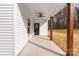 Covered porch featuring a ceiling fan, perfect for outdoor relaxation and entertaining guests at 1300 Eddie St, Gastonia, NC 28054