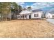 Beautiful single-story home with dark roof, complemented by white siding and a large front yard at 1300 Eddie St, Gastonia, NC 28054