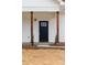 Charming home featuring a black front door with glass accents and stained wood posts at 1300 Eddie St, Gastonia, NC 28054