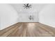 Bright living area boasting luxury vinyl flooring, a fan, and a window at 1300 Eddie St, Gastonia, NC 28054