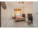 Bright bedroom featuring a comfortable bed and workspace at 1808 Wilton Gate Dr, Charlotte, NC 28262