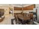 Kitchen with wooden cabinets, stainless steel appliances and dining table at 1808 Wilton Gate Dr, Charlotte, NC 28262
