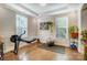 Bright exercise room with rowing machine, wall art, and natural light at 6012 Drave Ln, Fort Mill, SC 29715