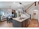 Beautiful kitchen with granite island, stainless steel appliances, and hardwood flooring at 6012 Drave Ln, Fort Mill, SC 29715