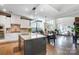 Spacious kitchen with a large island, granite countertops, stainless steel appliances, and hardwood flooring at 6012 Drave Ln, Fort Mill, SC 29715