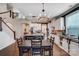 Open-concept kitchen with a large island, stainless steel appliances, and adjacent dining area at 6012 Drave Ln, Fort Mill, SC 29715