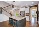 Beautiful kitchen with granite island, stainless steel appliances, and bar stool seating at 6012 Drave Ln, Fort Mill, SC 29715