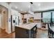 Well-equipped kitchen with granite island, stainless steel appliances, and ample white cabinetry at 6012 Drave Ln, Fort Mill, SC 29715
