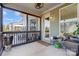 Charming screened porch featuring cozy decor, fan, and ample space for outdoor enjoyment at 6012 Drave Ln, Fort Mill, SC 29715