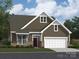 Craftsman style home with brown siding, stone accents, and a two-car garage at 1983 Copper Path Dr, Fort Mill, SC 29715