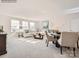 Open living area featuring a neutral color scheme and ample natural light at 1983 Copper Path Dr, Fort Mill, SC 29715