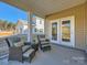 Relaxing screened porch with comfortable seating and backyard views at 1983 Copper Path Dr, Fort Mill, SC 29715