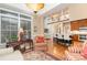 Bright living room features an open floor plan with hardwood floors and lots of natural light at 21315 Blakely Shores Dr, Cornelius, NC 28031