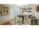 Bright dining room with hardwood floors, modern decor, and natural light at 3302 Selwyn Farms Ln, Charlotte, NC 28209