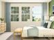 Bright bedroom with large windows and light bedding at 4499 Potters Wheel Dr, Fort Mill, SC 29715