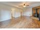 Spacious basement with wood burning stove and hardwood floors at 6815 Castlegate Dr, Charlotte, NC 28226