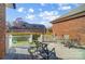 Back deck with seating area and view of backyard at 8420 Locksley Dr, Harrisburg, NC 28075