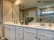 Double vanity bathroom with modern finishes at 123 Dogwood Grove Pl, Troutman, NC 28166