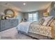 Spacious bedroom with large window and dresser at 123 Dogwood Grove Pl, Troutman, NC 28166