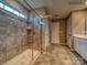 Walk in shower with glass door and tiled walls at 123 Dogwood Grove Pl, Troutman, NC 28166