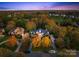 Autumn aerial view of home and surrounding neighborhood at 1511 Churchill Downs Dr, Waxhaw, NC 28173