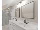 Bathroom with double vanity, large mirrors, and glass shower at 1511 Churchill Downs Dr, Waxhaw, NC 28173