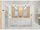 Elegant bathroom with double vanity and marble flooring at 1511 Churchill Downs Dr, Waxhaw, NC 28173