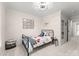 Small bedroom with a metal bed frame and car themed decor at 1511 Churchill Downs Dr, Waxhaw, NC 28173