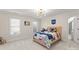 Cozy bedroom with a wooden bed frame and Mickey Mouse decor at 1511 Churchill Downs Dr, Waxhaw, NC 28173