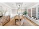 Spacious dining area featuring a rustic wooden table and neutral decor at 1511 Churchill Downs Dr, Waxhaw, NC 28173