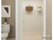 Simple wire shelving in a small bathroom closet at 1578 Croyden St, Indian Land, SC 29707