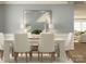 Bright dining room with modern white table and chairs at 1578 Croyden St, Indian Land, SC 29707