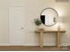 Light and airy entryway with a console table and large mirror at 1578 Croyden St, Indian Land, SC 29707