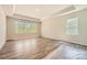Serene main bedroom with tray ceiling and large windows offering natural light at 1578 Croydon St, Indian Land, SC 29707